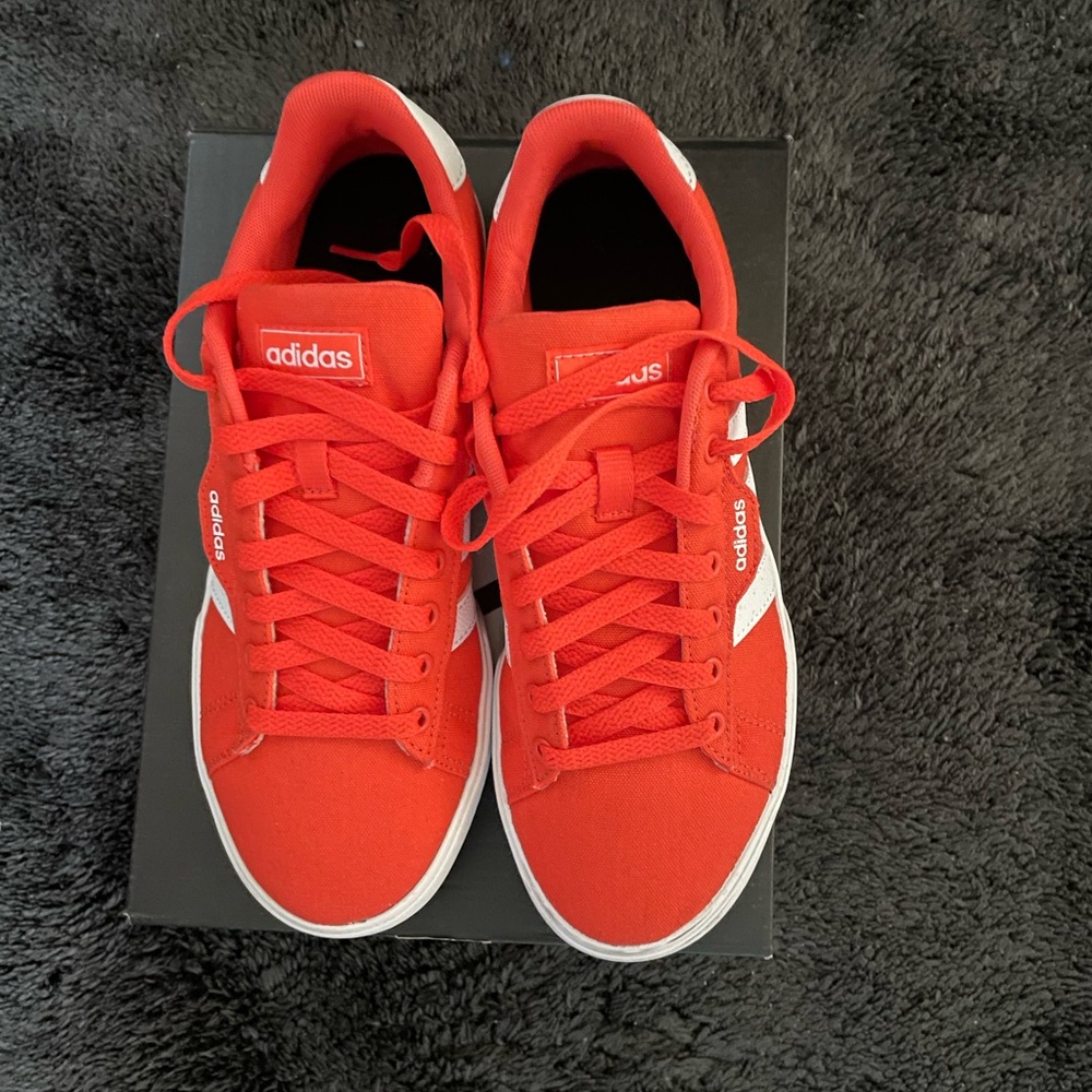 Adidas orange skateboard sneakers a Big kids size 7 women’s size 8
lowest $30